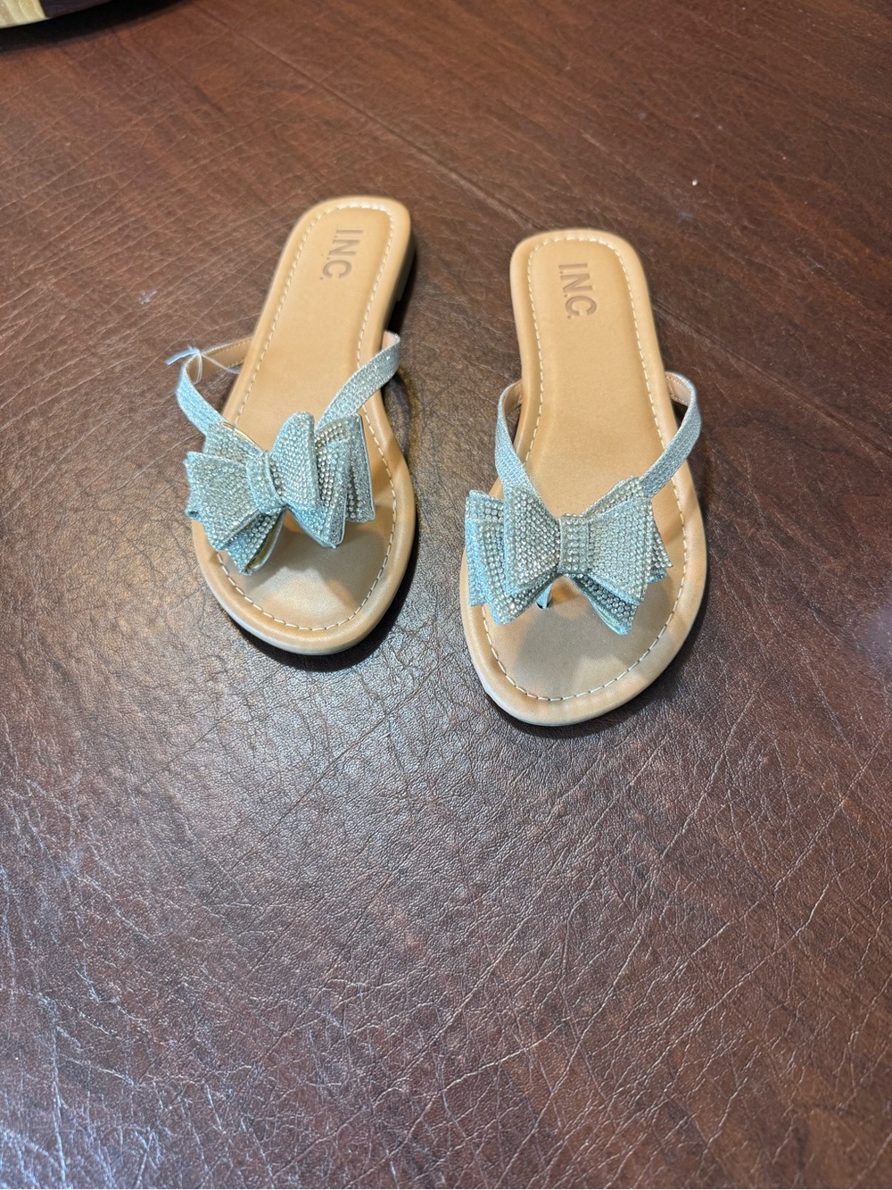NWT INC International Concepts Silver Bling Bow Thong Sandals Size 6